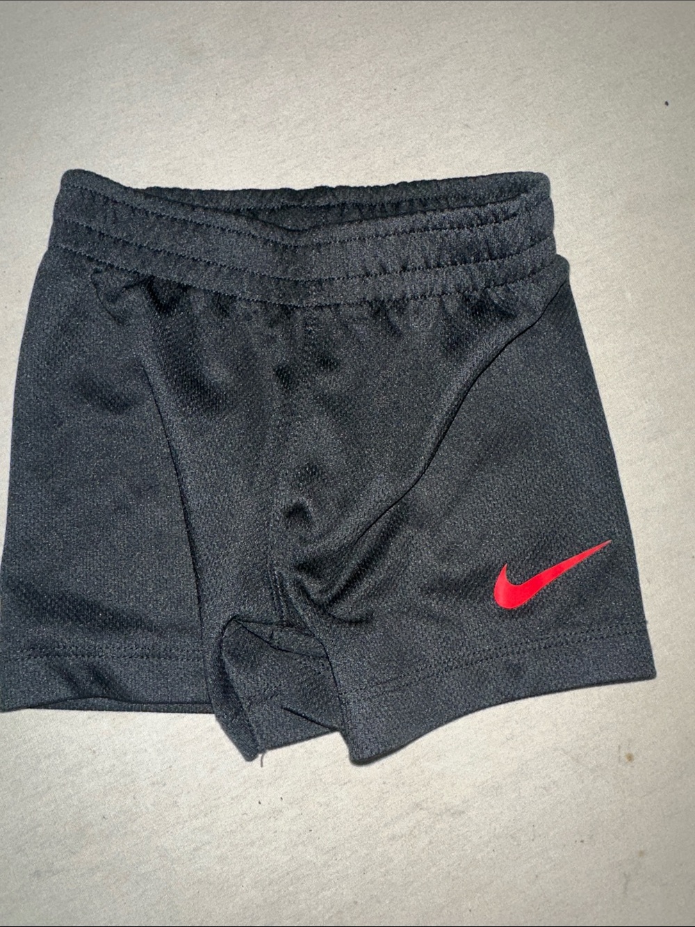 Kids Size 12M Nike Black Athletic Shorts with Red Swoosh